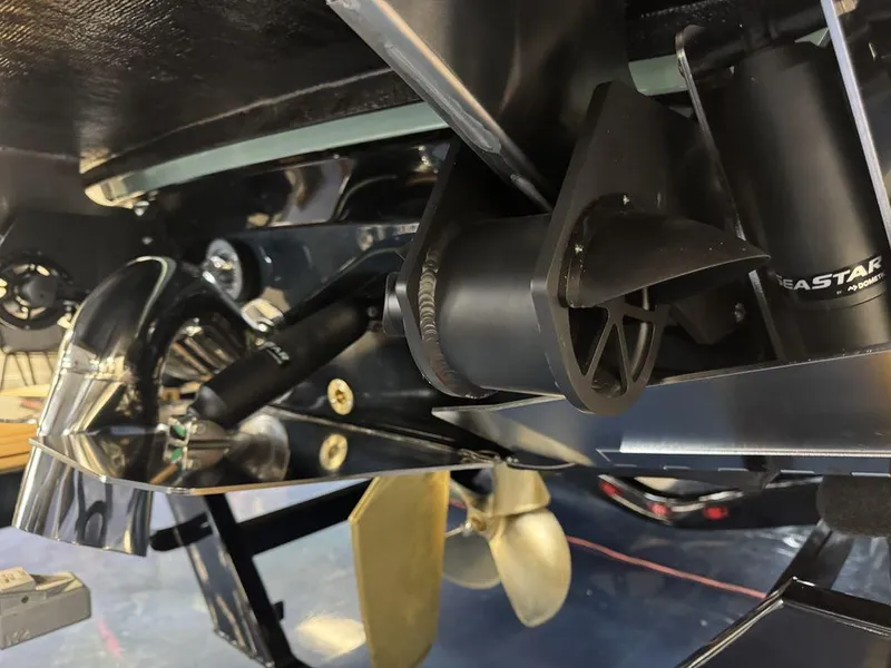 Slide: The Image of Close-up of 2025 Supra SL 450 boat's advanced propulsion system and components. - 33