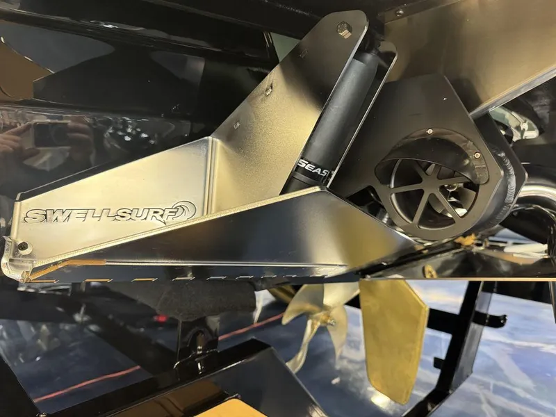 Slide: The Image of Close-up of 2025 Supra SL 450 boat's Swell Surf system component. - 34