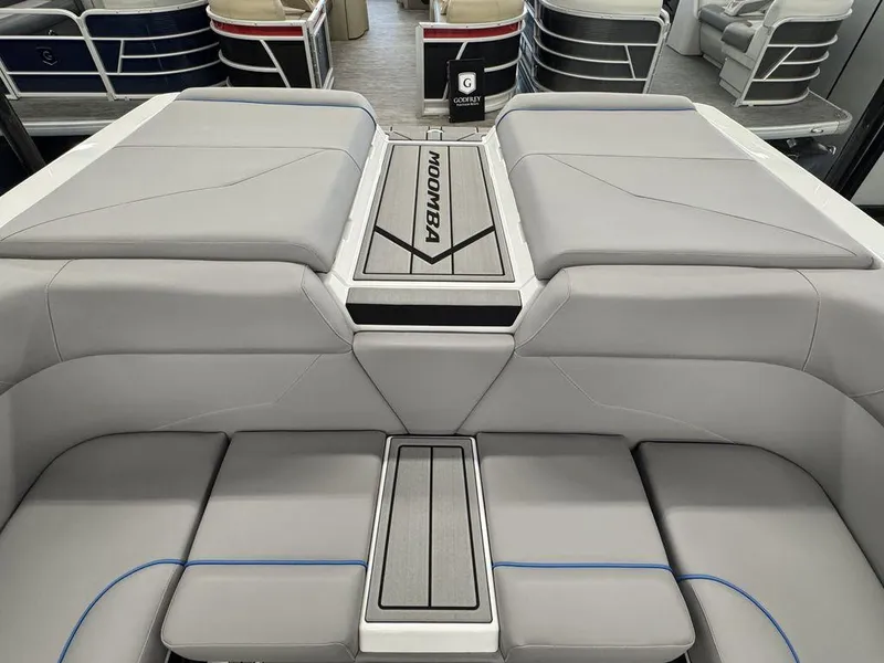 Slide: The Image of 2025 Moomba Mondo boat interior with sleek gray seating and modern design. - 3