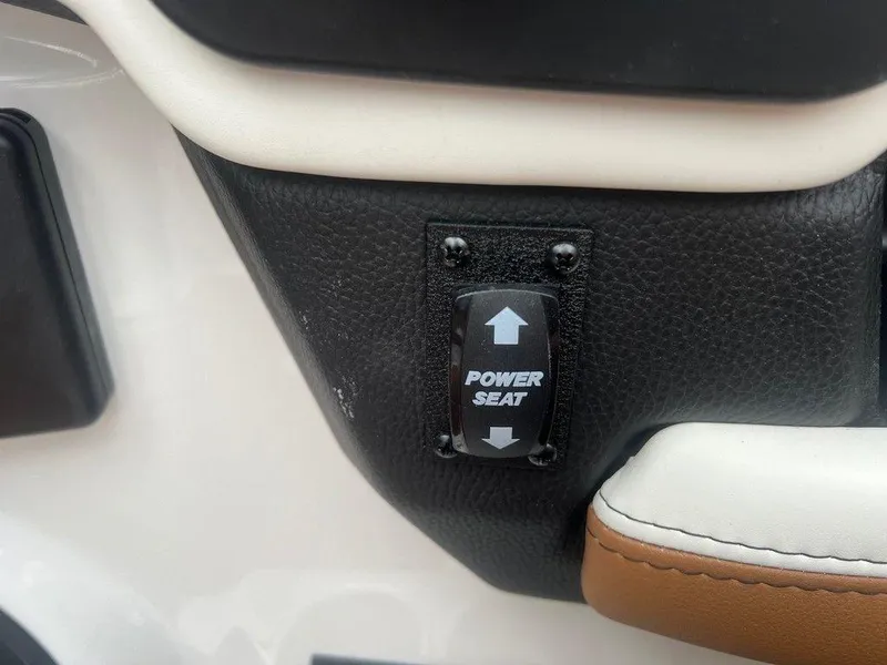 Slide: The Image of Power seat control in 2025 Malibu 23 MXZ boat interior. - 12