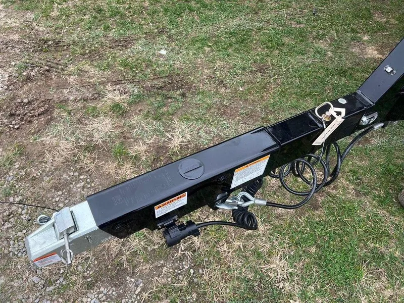Slide: The Image of Trailer hitch of 2025 Malibu 23 MXZ on grass. - 25