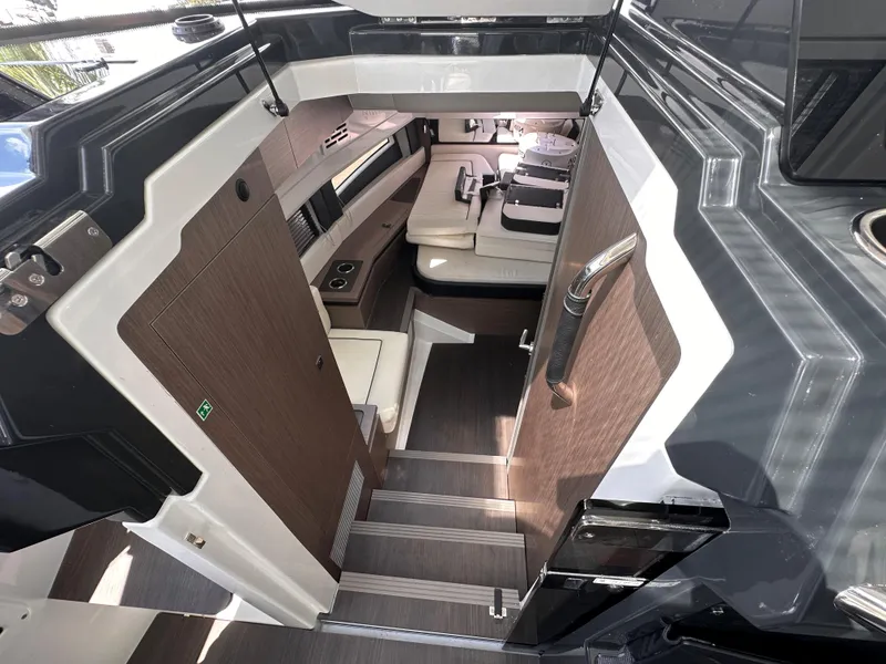 Slide: The Image of Luxurious bathroom in 2023 Wellcraft 355 boat with modern sink and toilet. - 16