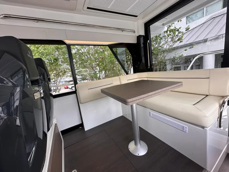 Slide: The Image of Interior of 2023 Wellcraft 355 boat, featuring modern seating and sleek design. - 7
