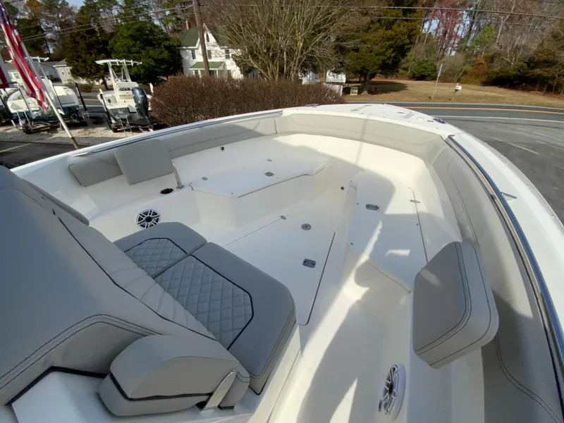 Slide: The Image of 2025 Pursuit S 288 Sport boat interior with sleek seating and modern design. - 26