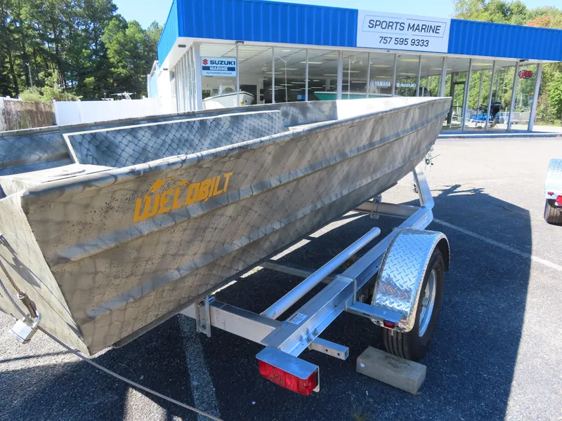 Slide: The Image of 2025 WeldBilt 1852 boat on trailer at Sports Marine dealership. - 10
