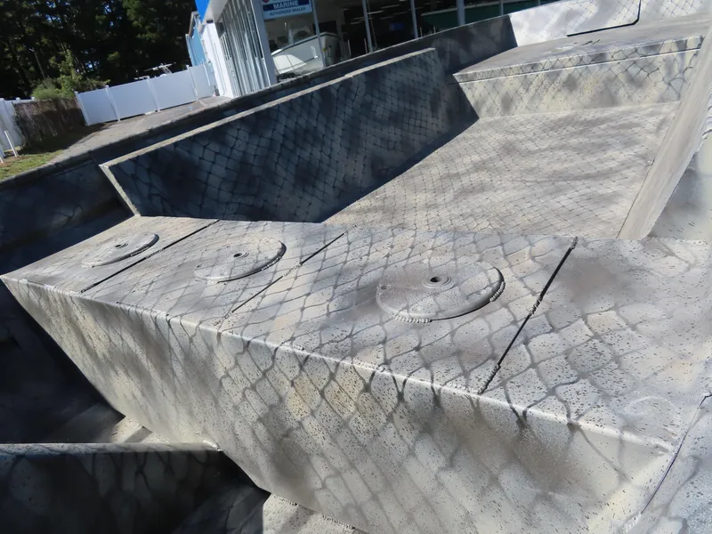 Slide: The Image of Concrete skatepark with geometric patterns and ramps, WeldBilt 1852, 2025 model. - 13