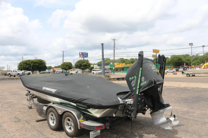 Slide: The Image of 2016 Phoenix 920 ProXP boat deck with trolling motor and navigation system. - 10