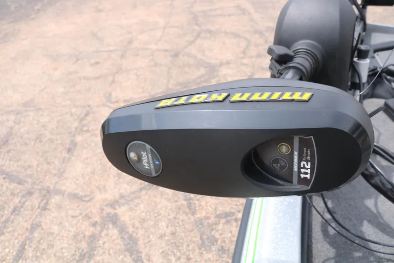 Slide: The Image of 2016 Phoenix 920 ProXP boat interior with carpeted deck and steering console. - 21