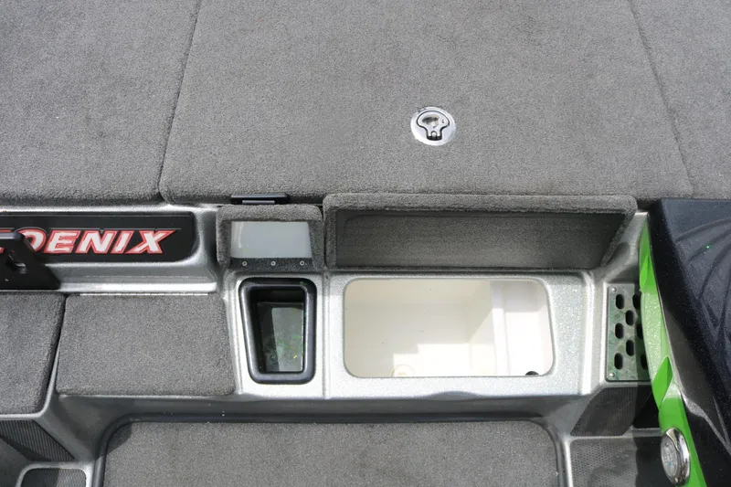 Slide: The Image of 2016 Phoenix 920 ProXP boat deck with seating and storage compartments. - 28