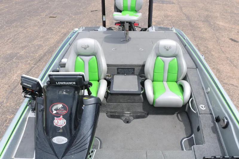 Slide: The Image of 2016 Phoenix 920 ProXP boat deck with storage compartments and pole. - 31