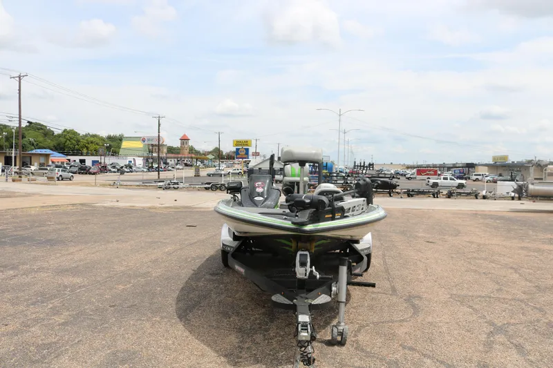 Slide: The Image of 2016 Phoenix 920 ProXP boat in parking lot under clear blue sky. - 5