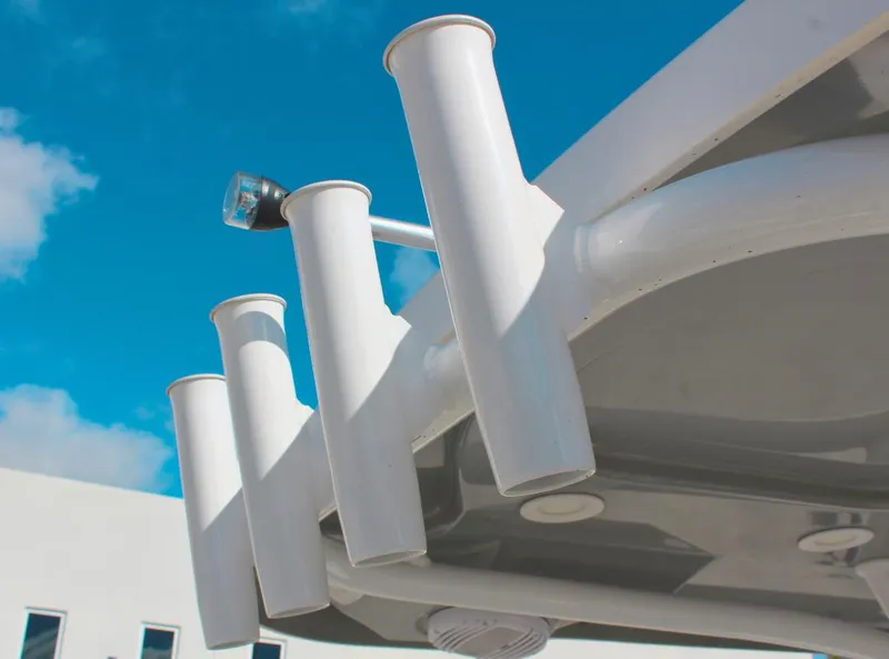 Slide: The Image of Seapro 259 boat rod holders, 2023 model, under clear blue sky. - 15