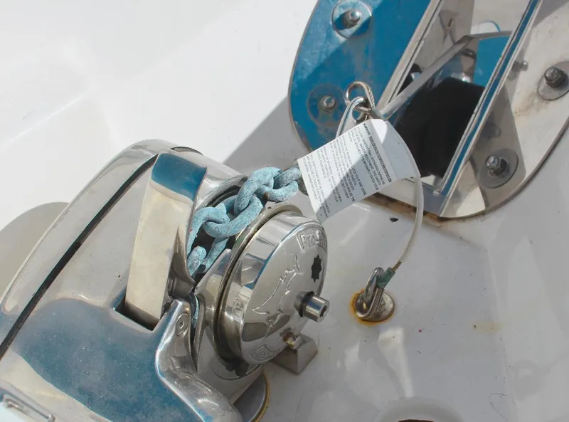Slide: The Image of Seapro 259 boat anchor windlass system, 2023 model, with blue chain and safety tag. - 21