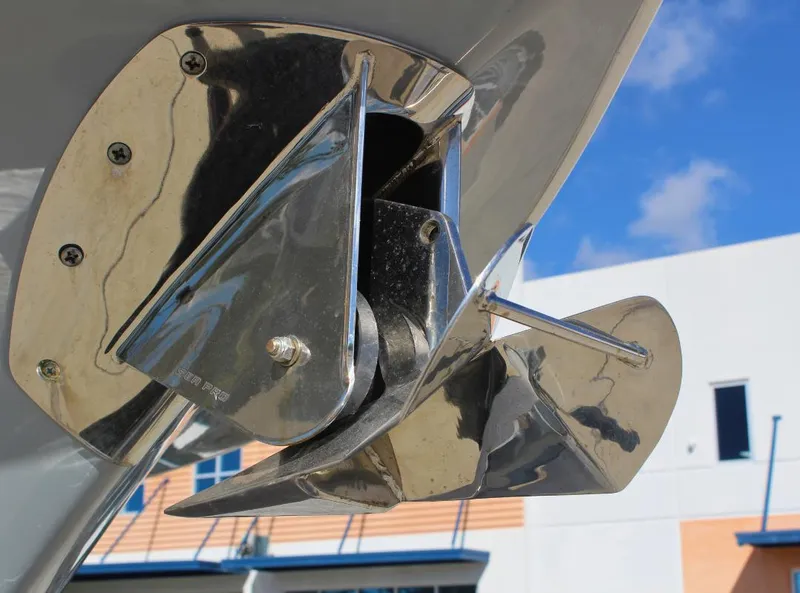 Slide: The Image of Close-up of a 2023 Seapro 259 boat anchor against a blue sky. - 22
