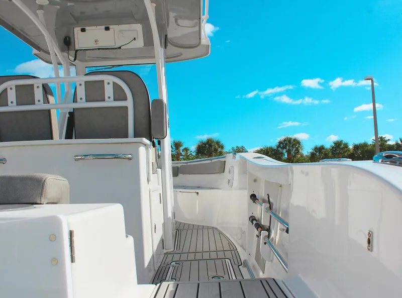 Slide: The Image of 2023 Seapro 259 boat interior with sleek design and modern features under a clear blue sky. - 7