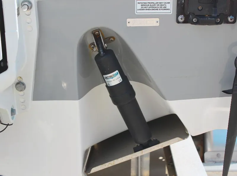 Slide: The Image of 2023 Seapro 259 boat trim tab actuator detail. - 9