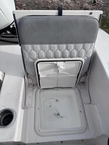 Slide: The Image of 2025 Carolina Skiff 22 Ultra Elite boat seat with storage compartment. - 20