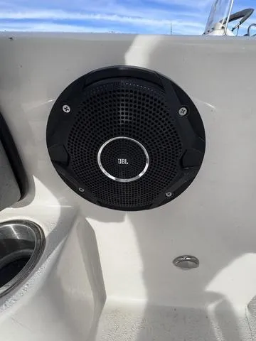 Slide: The Image of 2025 Carolina Skiff 22 Ultra Elite with JBL speaker on deck. - 24