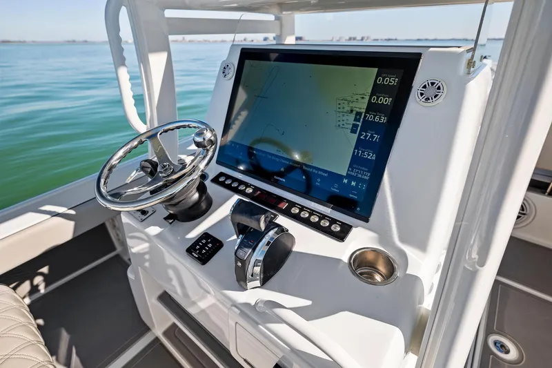 Slide: The Image of 2021 Barker Boatworks 26 Open helm with advanced navigation display. - 17