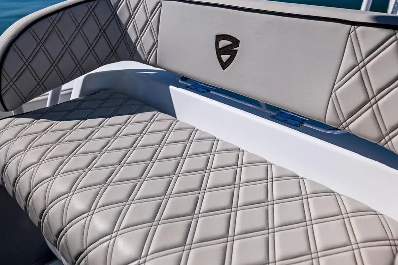 Slide: The Image of 2021 Barker Boatworks 26 Open, luxurious diamond-stitched seating detail. - 19