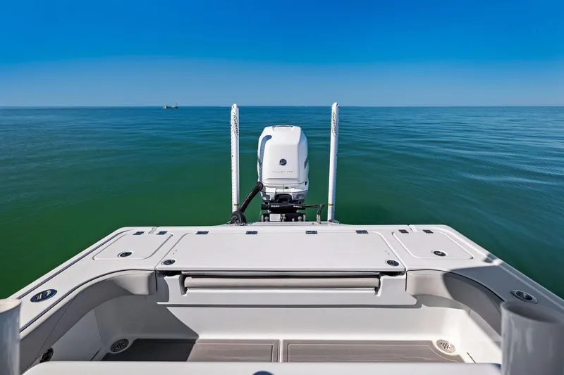 Slide: The Image of 2021 Barker Boatworks 26 Open on calm sea, rear view. - 26