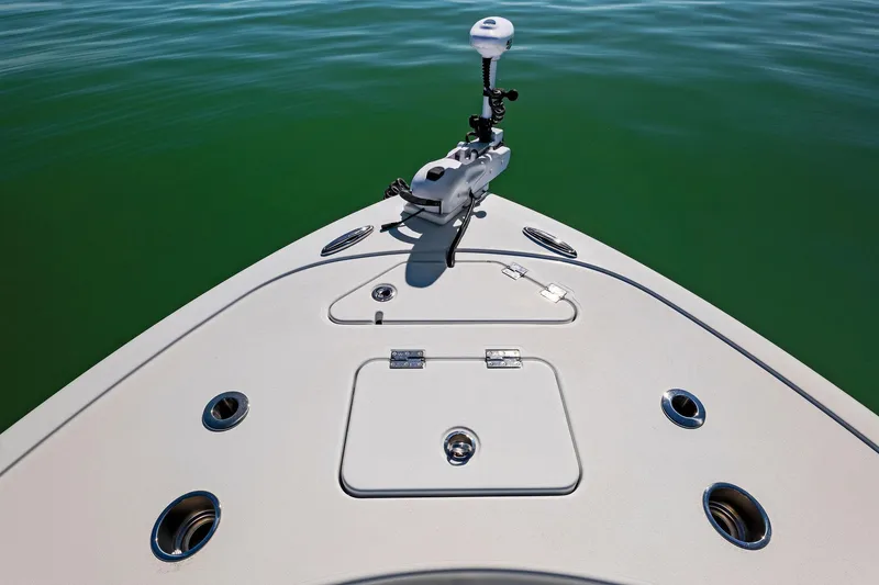 Slide: The Image of Barker Boatworks 26 Open 2021 bow with fishing equipment on calm water. - 7