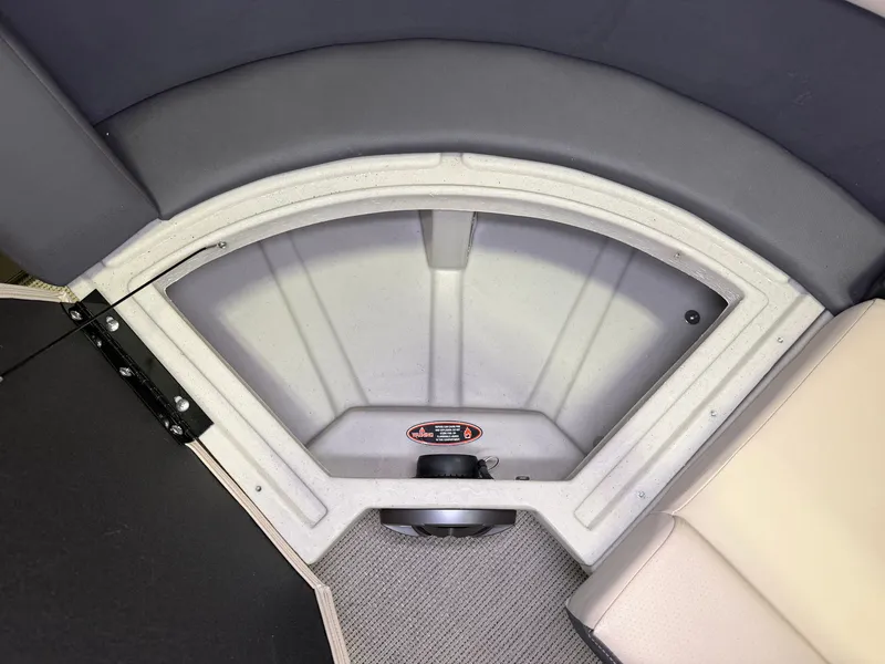 Slide: The Image of A seating area with gray cushions and storage space underneath. - 3