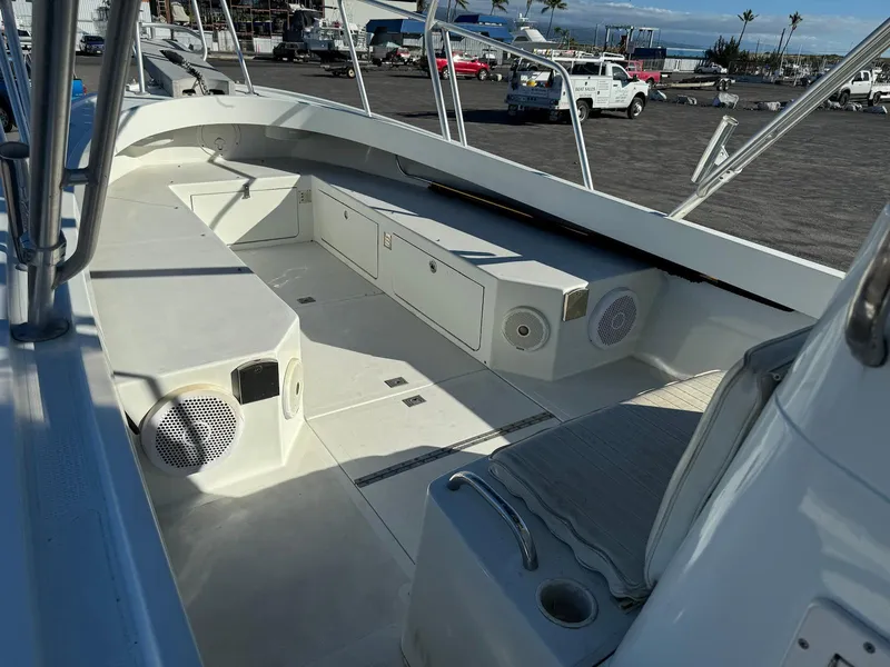 Slide: The Image of 1997 Shamrock 260 Open boat interior with seating and storage compartments. - 17