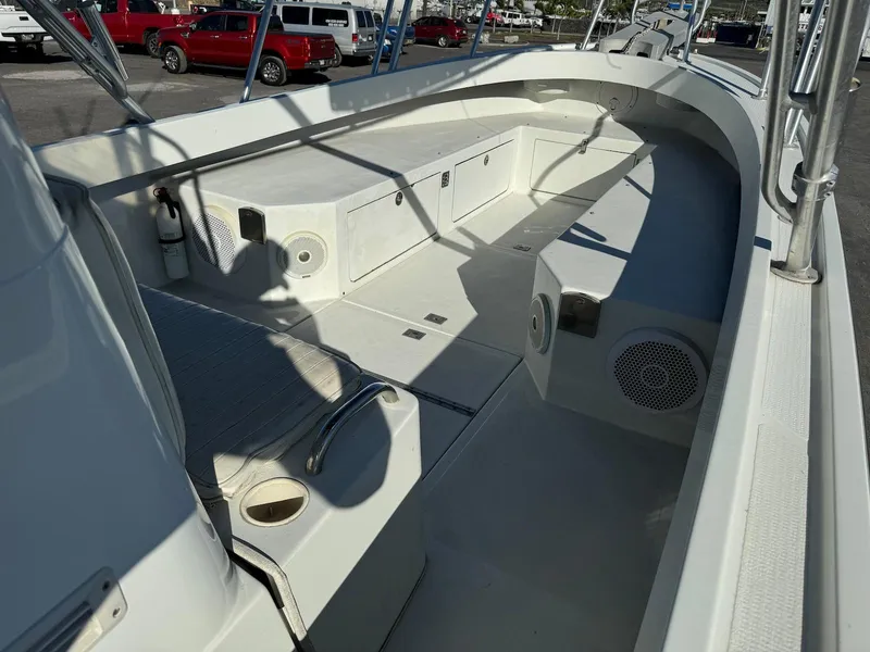 Slide: The Image of 1997 Shamrock 260 Open boat interior, featuring spacious deck and storage compartments. - 18