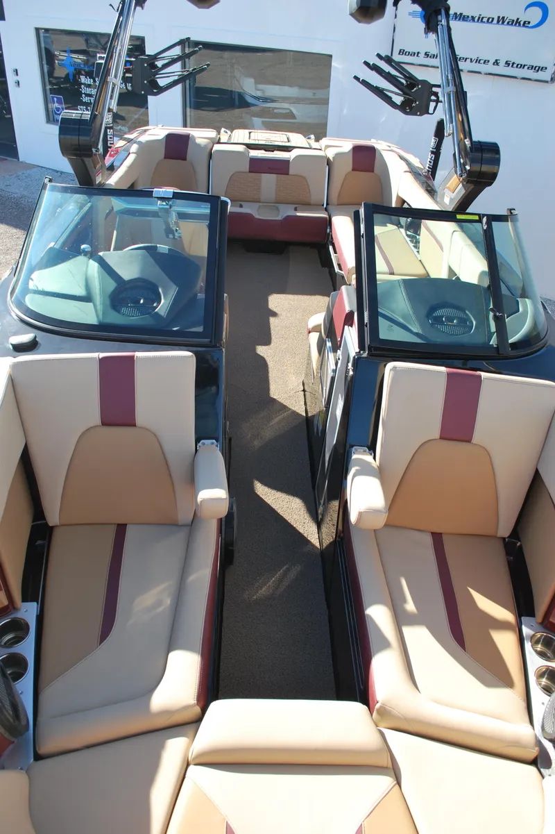 Slide: The Image of 2023 MasterCraft X24 boat interior with luxurious seating and modern design. - 5