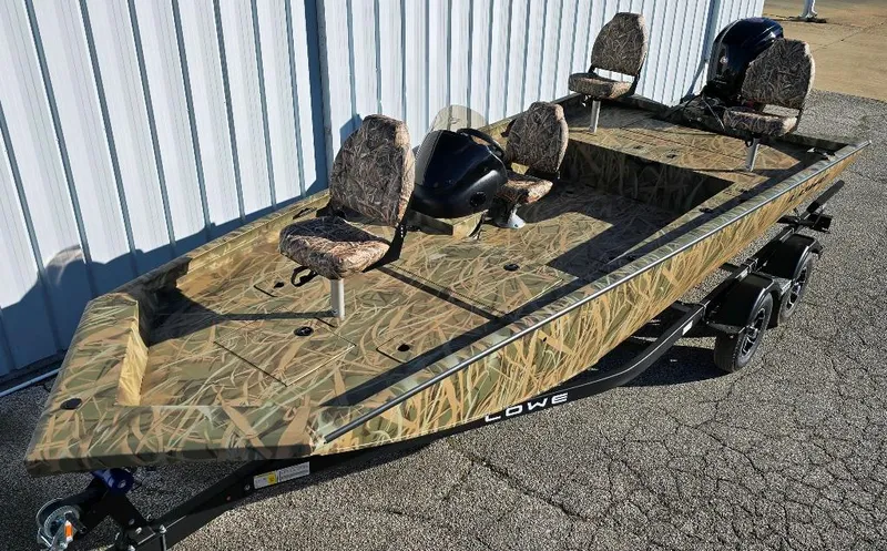 The Image of 2025 Lowe Outlet 20 boat with camouflage paint and 2 additional pedestal seats on a tandem axle trailer with brakes. - 0