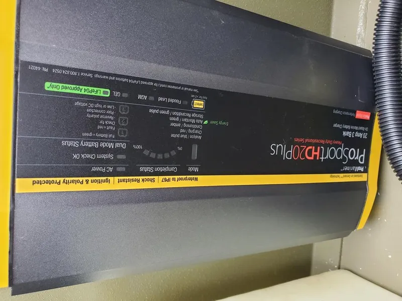 Slide: The Image of Onboard ProSport HD20 Plus battery charger. - 19