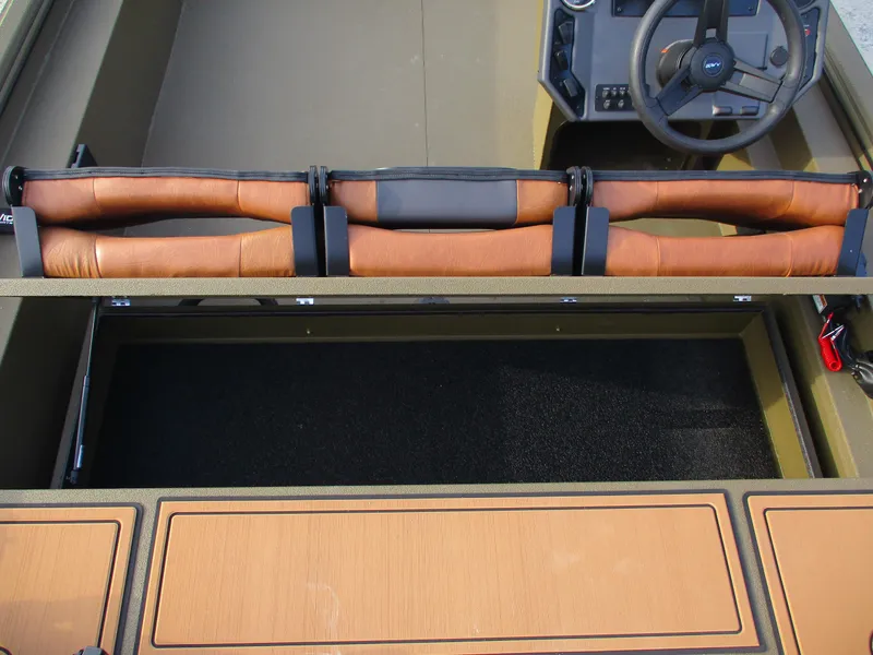 Slide: The Image of Interior of 2025 Avid 18 Rogue SC boat with leather seating and steering wheel. - 10