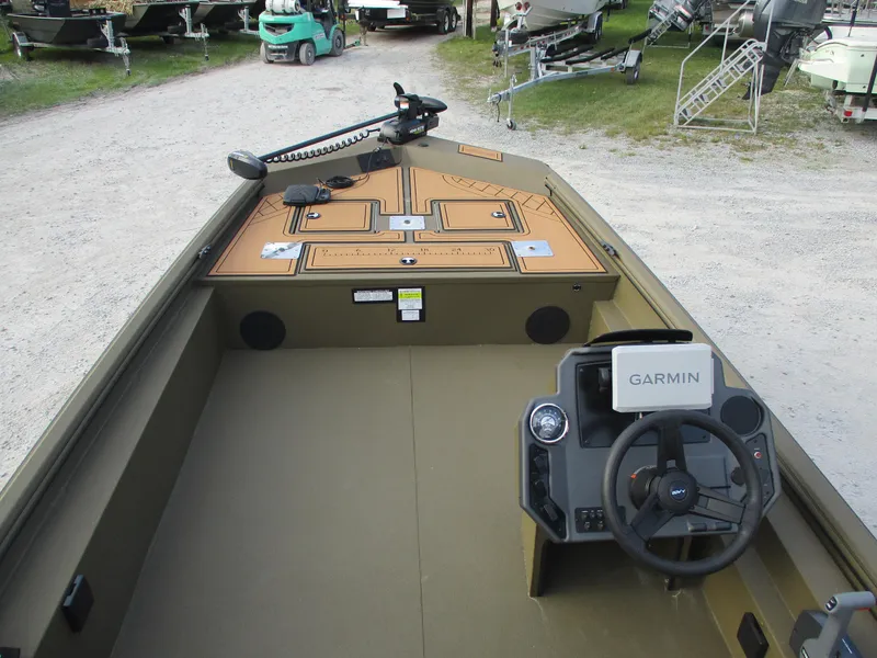 Slide: The Image of 2025 Avid 18 Rogue SC boat interior with Garmin navigation system. - 4