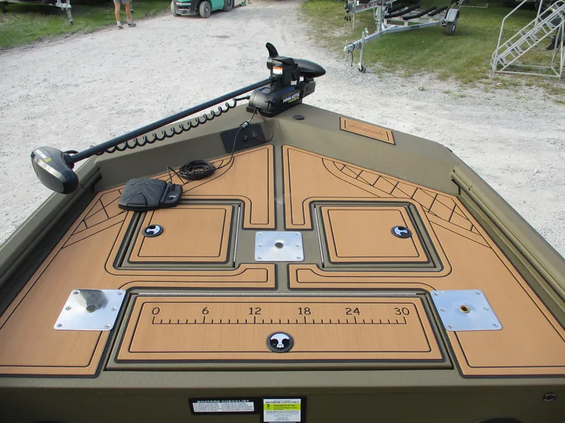 Slide: The Image of 2025 Avid 18 Rogue SC boat deck with measurement markings and mounted equipment. - 5