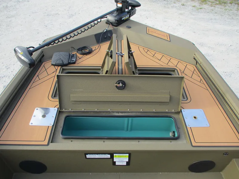 Slide: The Image of Avid 18 Rogue SC 2025 boat interior with storage compartments and fishing equipment. - 6