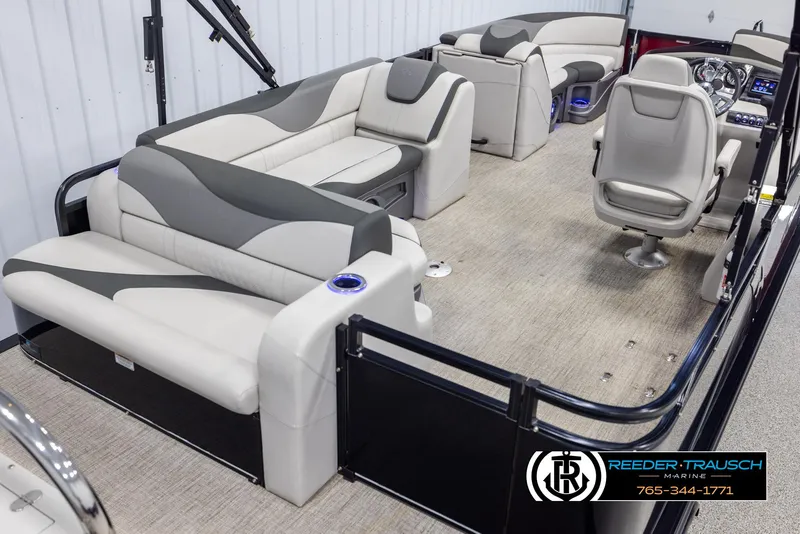 Slide: The Image of 2023 Avalon LSZ CRB pontoon boat interior with plush seating and modern design. - 12