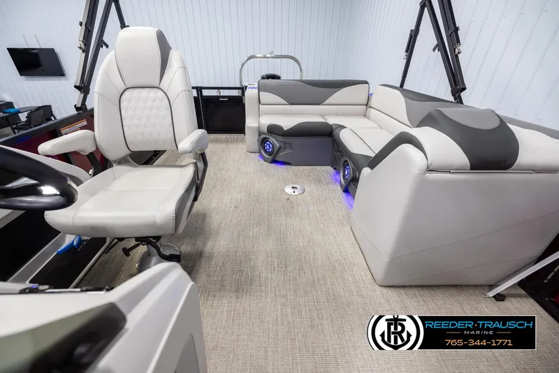 Slide: The Image of 2023 Avalon LSZ CRB boat interior with plush seating and modern design. - 14