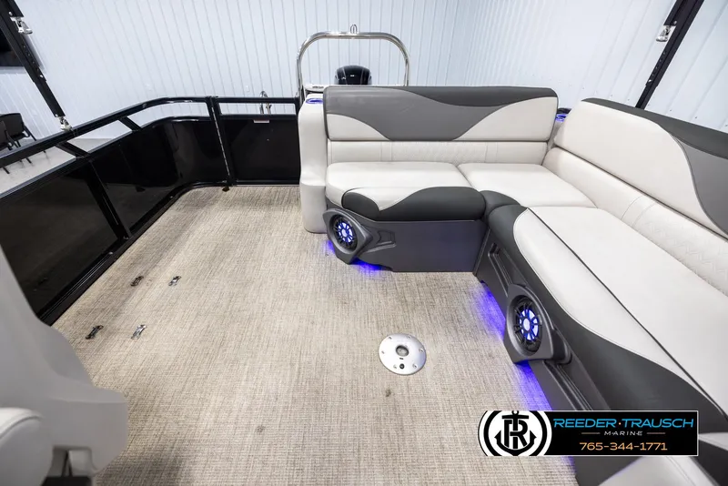 Slide: The Image of 2023 Avalon LSZ CRB boat interior with plush seating and LED lighting. - 15