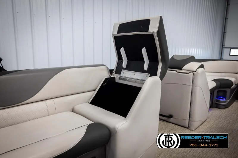 Slide: The Image of 2023 Avalon LSZ CRB boat interior with storage compartment open. - 28