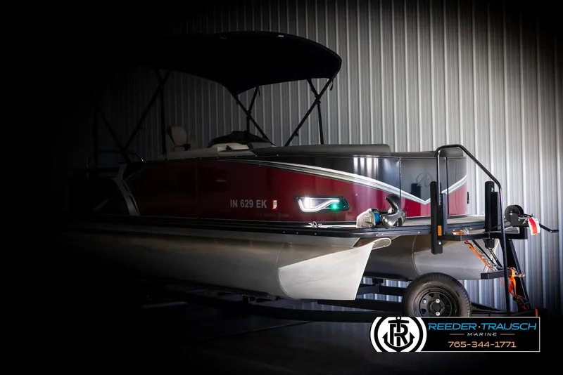 Slide: The Image of 2023 Avalon LSZ CRB pontoon boat in storage, side view. - 4