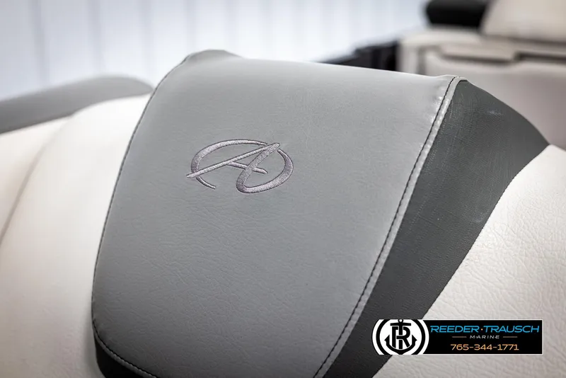 Slide: The Image of 2023 Avalon LSZ CRB boat seat with embroidered logo, Reeder-Trausch Marine contact info. - 41