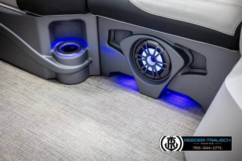 Slide: The Image of 2023 Avalon LSZ CRB interior with illuminated speaker and cup holder. - 43