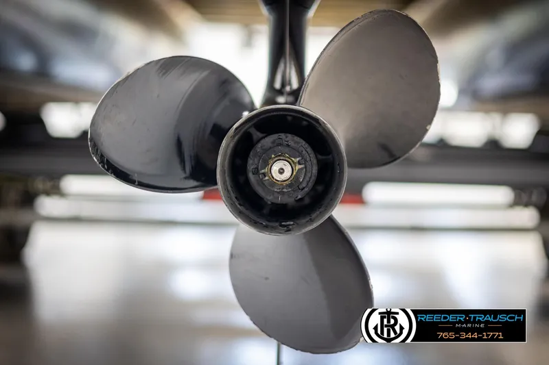 Slide: The Image of Close-up of a 2023 Avalon LSZ CRB boat propeller in a showroom. - 49