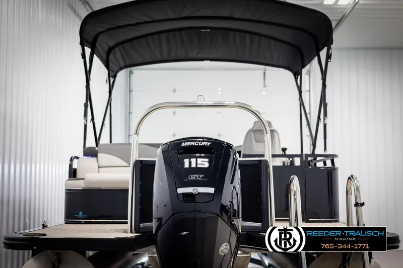 Slide: The Image of 2023 Avalon LSZ CRB pontoon boat with Mercury 115 engine in showroom. - 7