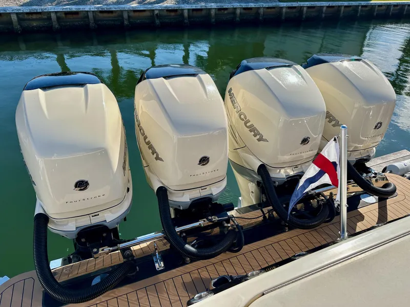 Slide: The Image of Four Mercury outboard engines on a 2019 Scout 380 LXF boat. - 25