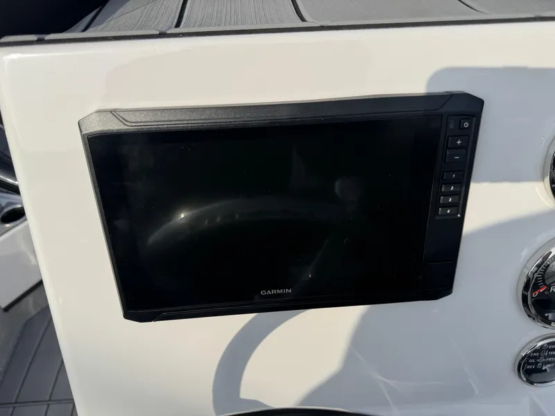 Slide: The Image of Garmin display on 2025 Vexus ACX 2210 boat dashboard. - 12