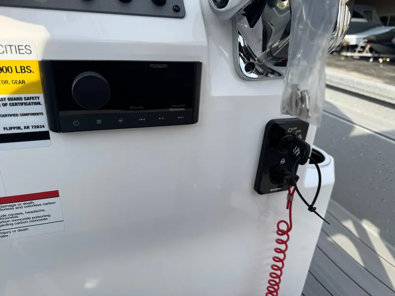 Slide: The Image of Close-up of 2025 Vexus ACX 2210 boat dashboard with control panel and safety features. - 15