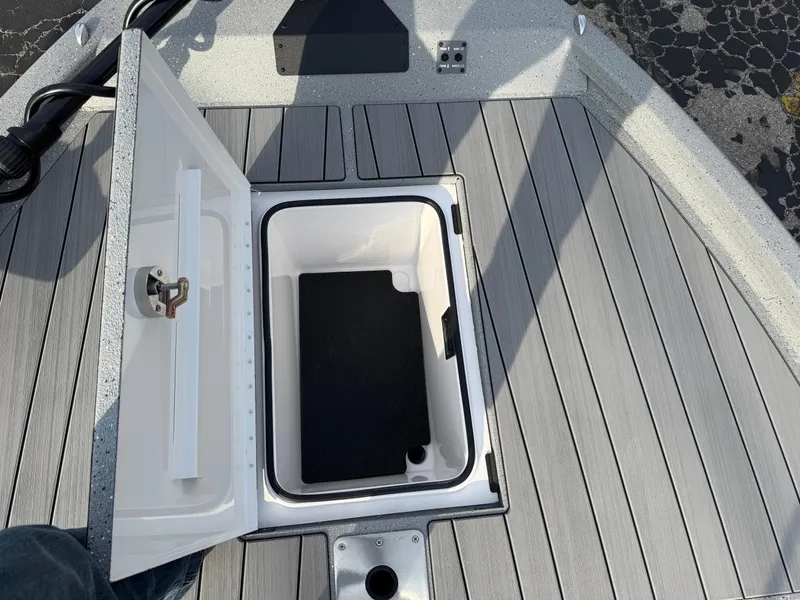 Slide: The Image of Open storage compartment on 2025 Vexus ACX 2210 boat deck. - 34