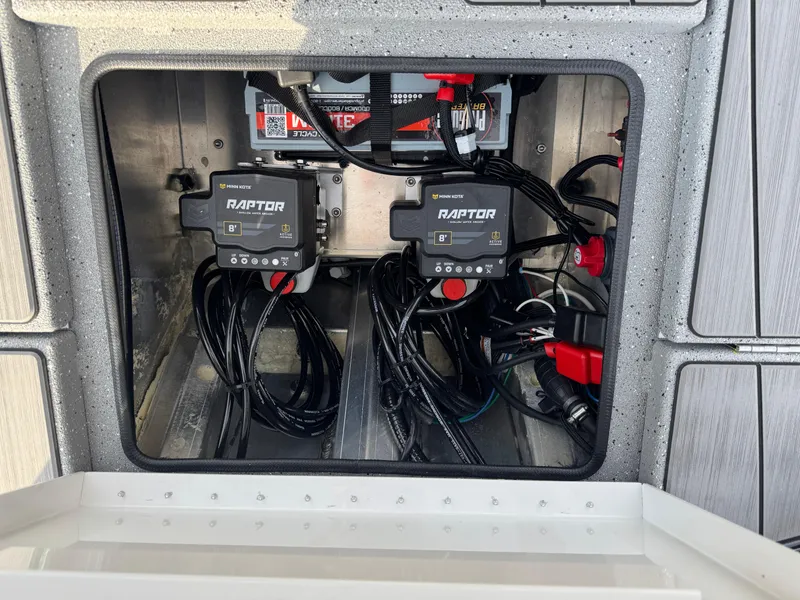 Slide: The Image of 2025 Vexus ACX 2210 boat battery compartment with Raptor power systems. - 47